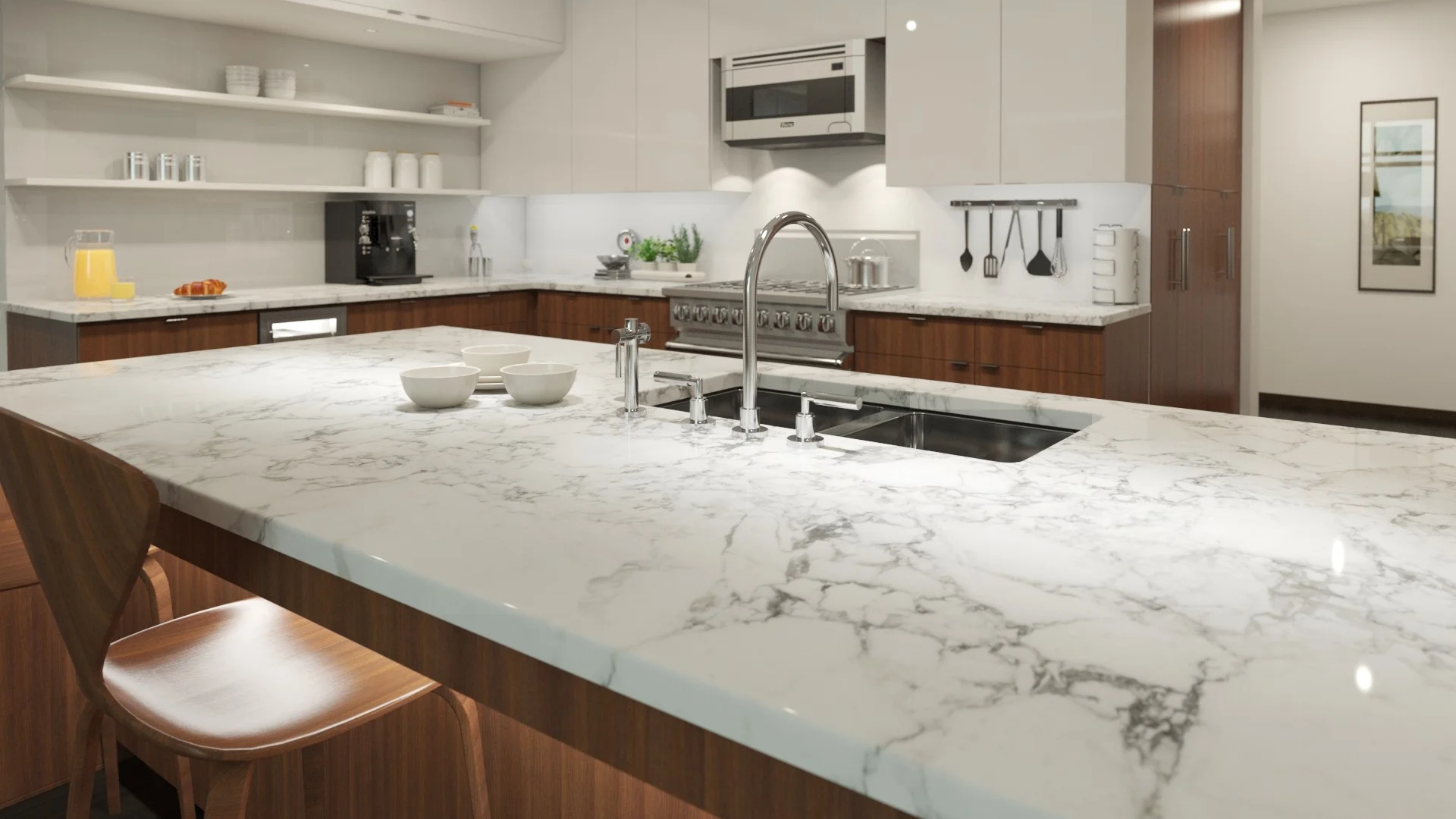 White marble kitchen countertops with gray veining installed on island and perimeter with dark wood cabinetry